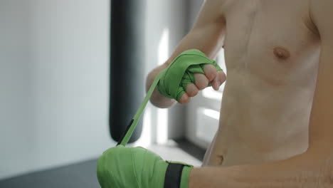 Man Wrapping Boxing Hand Wraps