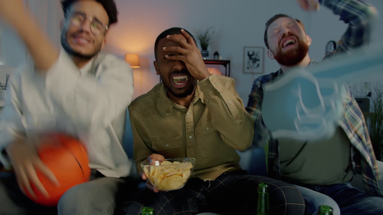 Friends Watching a Basketball Game