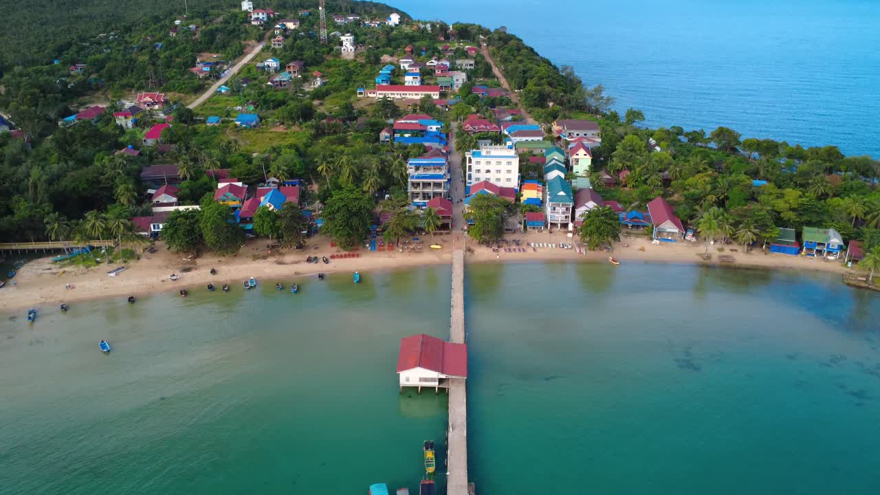 M'Pai Bay pier small village tourist destination island of Koh Rong Samloem Cambodia aerial drone