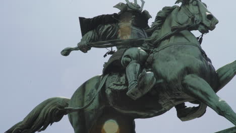 statue of kusunoki masashige low angle closeup cinematic footage looking at emperor shogun