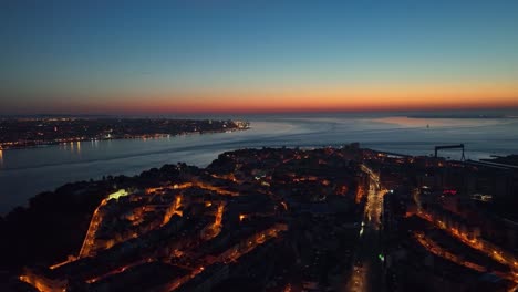 Drone-footage-from-flying-over-Almada-before-sunrise