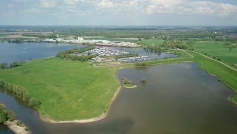 aerial drone view of the small harbor in the countryside of the netherlands