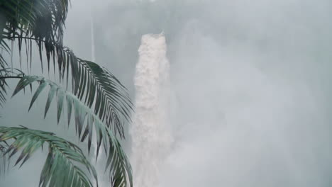 thundering bajos del toro waterfall in peak of rainy season surrounded by mist