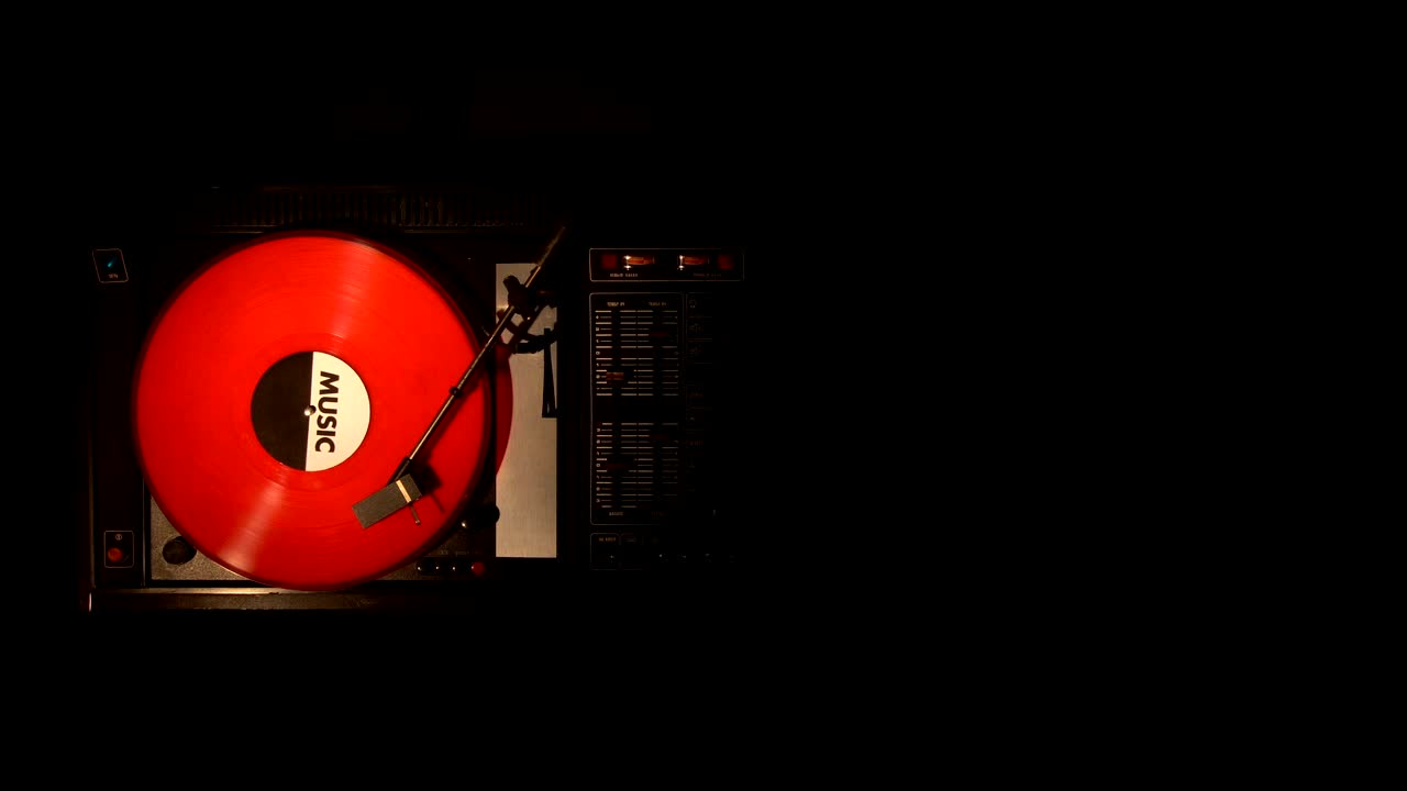 Vinyl record on the pleer. Plays a song from an old turntable.