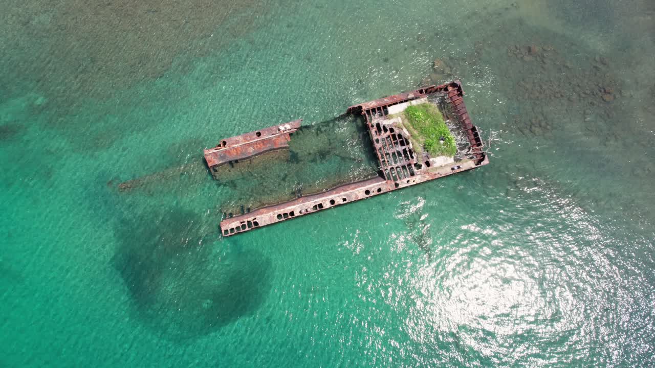 Drone orbit in clockwise direction showcasing Puerto Viejo beach and its surrounding natural beauty.