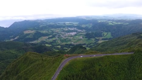 Flying-high-bove-the-clouds-on-the-island-of-Pico-in-the-Azores,-Portugal