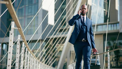 businessman talking on phone in city