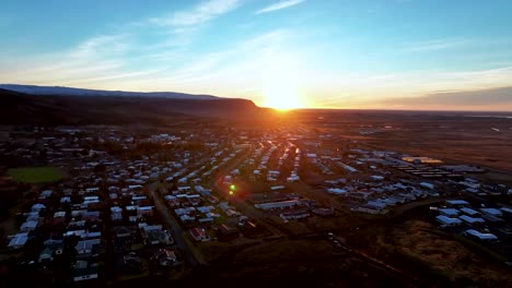 aerial view of hveragerdi townscape during sunrise in south of iceland