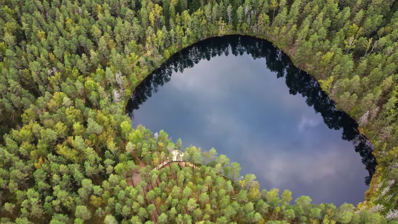 Certoks lake Devil's Lake high establisher aerial view, circling around, day