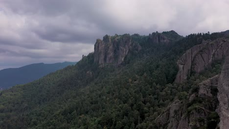 Drone-shot-of-a-mountains-deep-in-the-forest