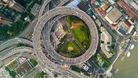 china sunny day shanghai cityscape famous round traffic road junction aerial panorama 4k time lapse