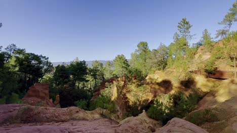 Nature-landscape-of-France-in-the-evening-light-with-ocher-rocks-and-wide-landscape