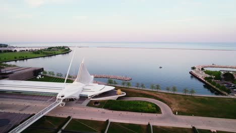 aerial orbiting above milwaukee wisconsin downtown - aerial sunset