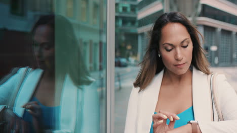 Beautiful-mixed-race-business-woman-walking-through-city