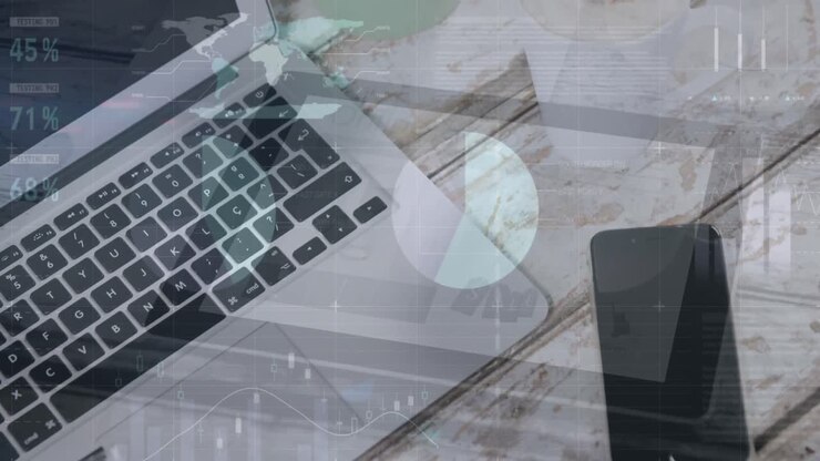 Animation of statistical data processing against laptop, smartphone and glasses on wooden table