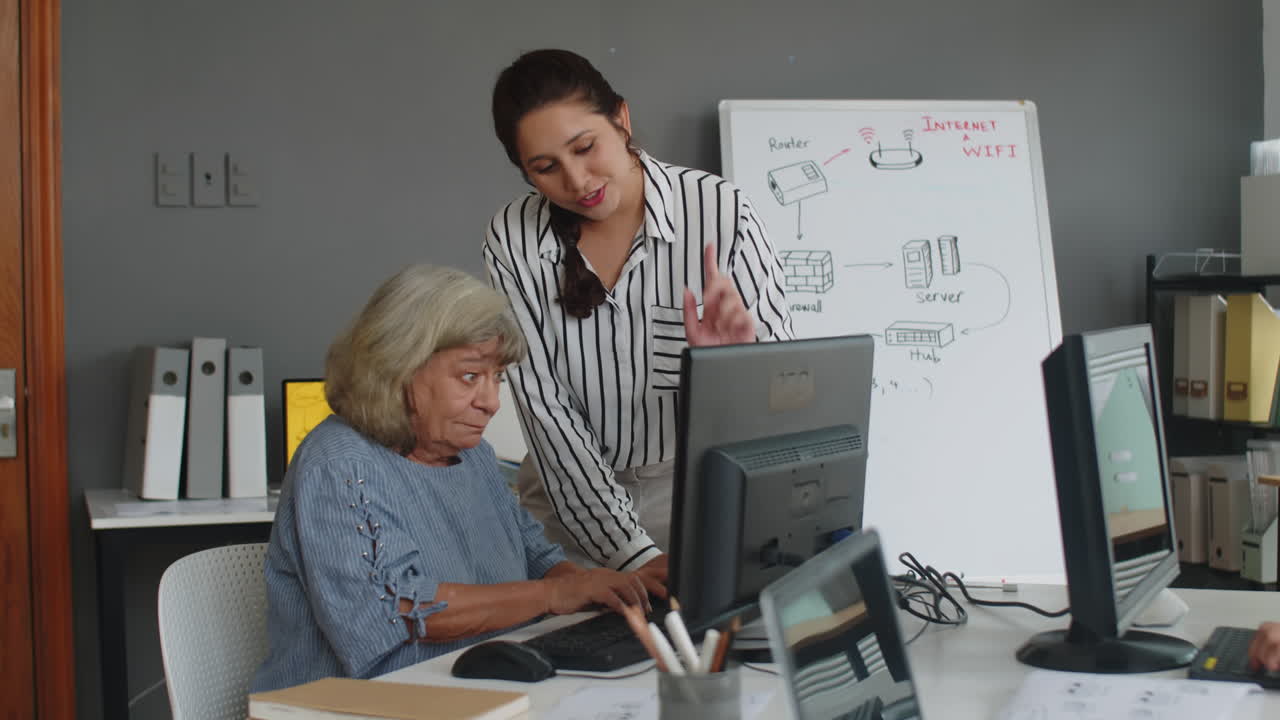 Aged Woman Attending Computer Class