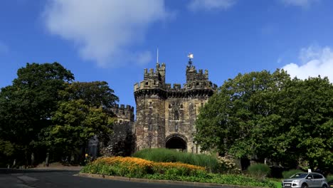 lancaster castle with flowers and deep blue sky