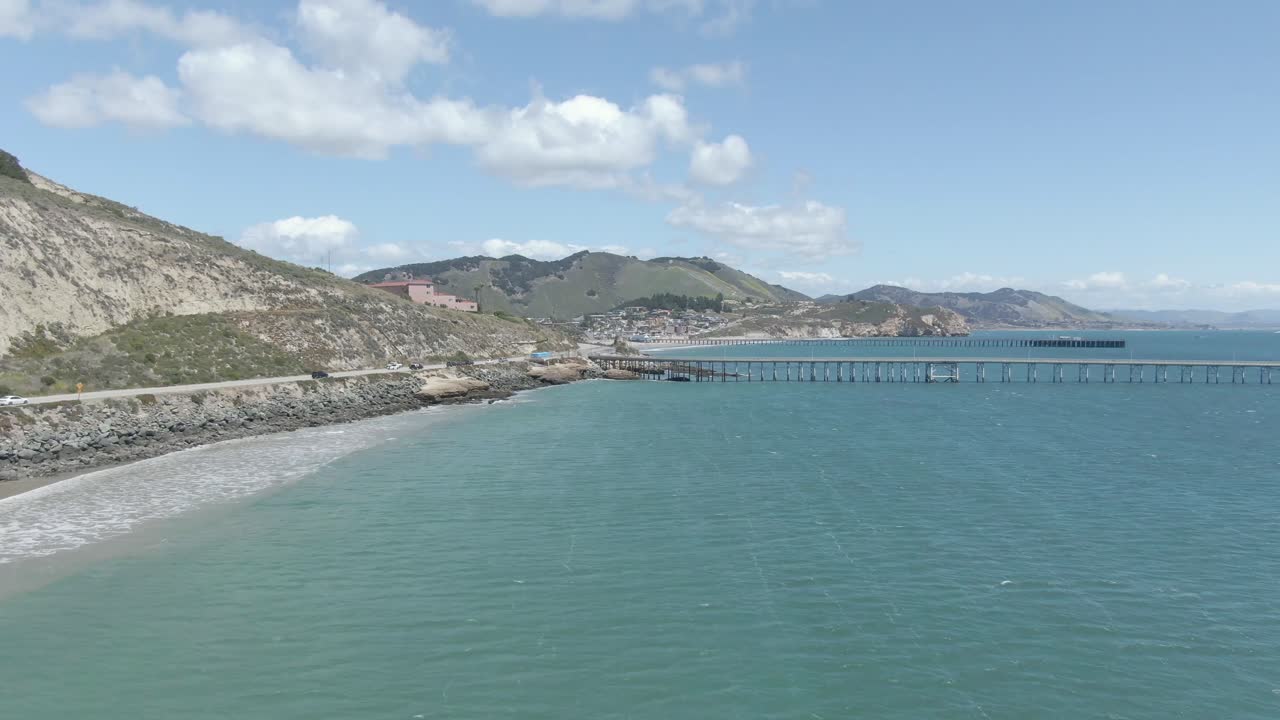 High-angle view of the iconic Avila Beach Pier and boardwalk. Perfect for regional tourism promos and coastal lifestyle storytelling