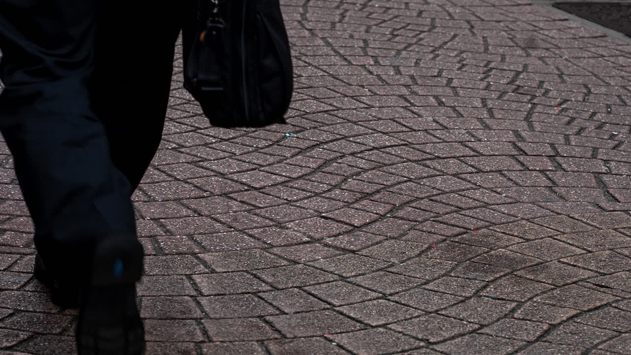 Timelapse Close Up of Human Legs Walking on Pedestrian Street in Urban City