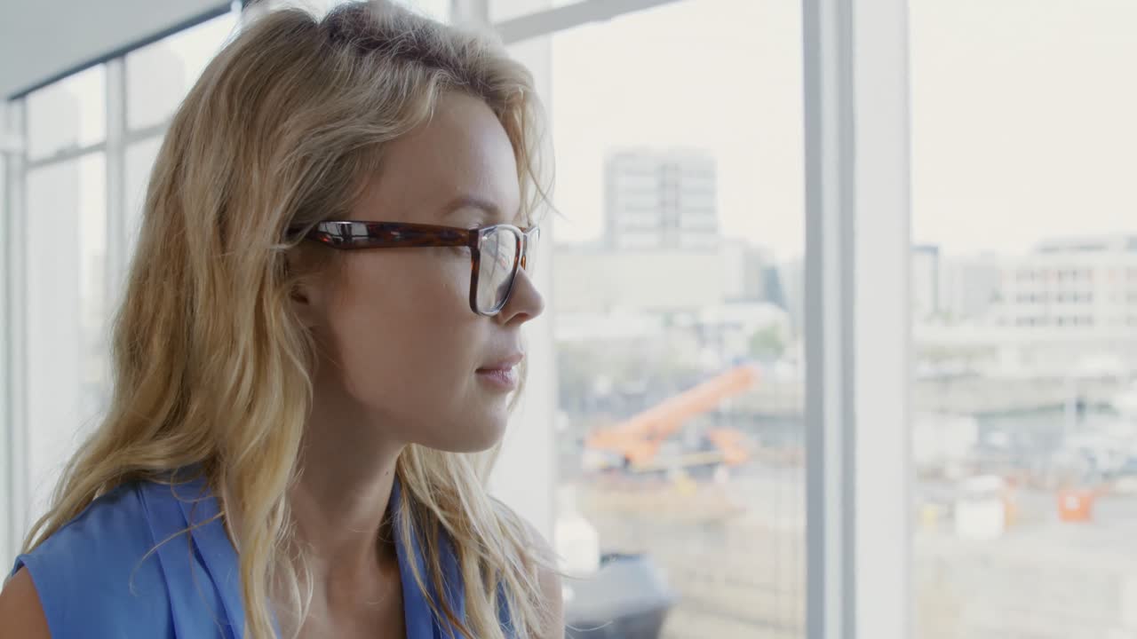 Young woman in a creative office