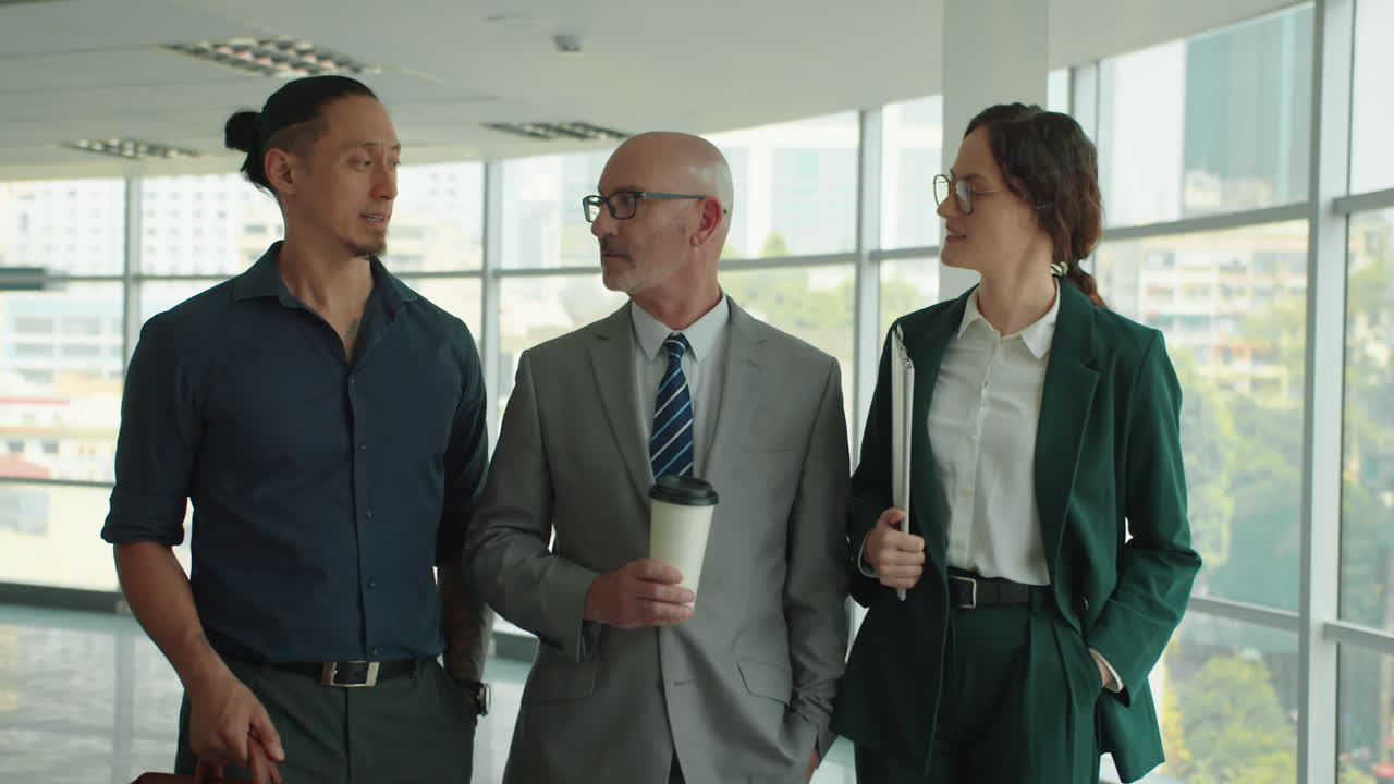 Portrait of Businessman and Partners Meeting at Office