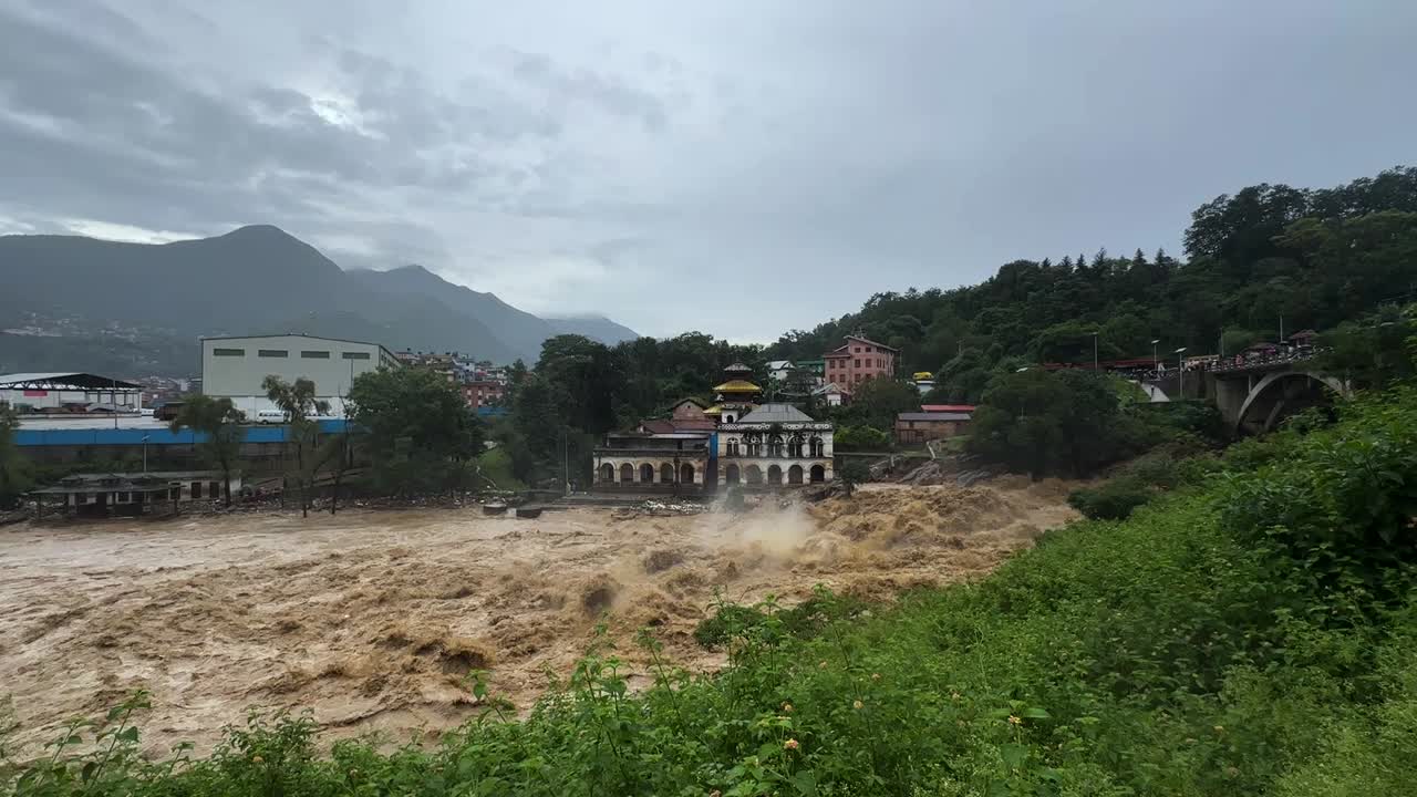 The Bagmati River flooded and affected the riverbanks and homes during heavy rainfall in Kathmandu, Nepal