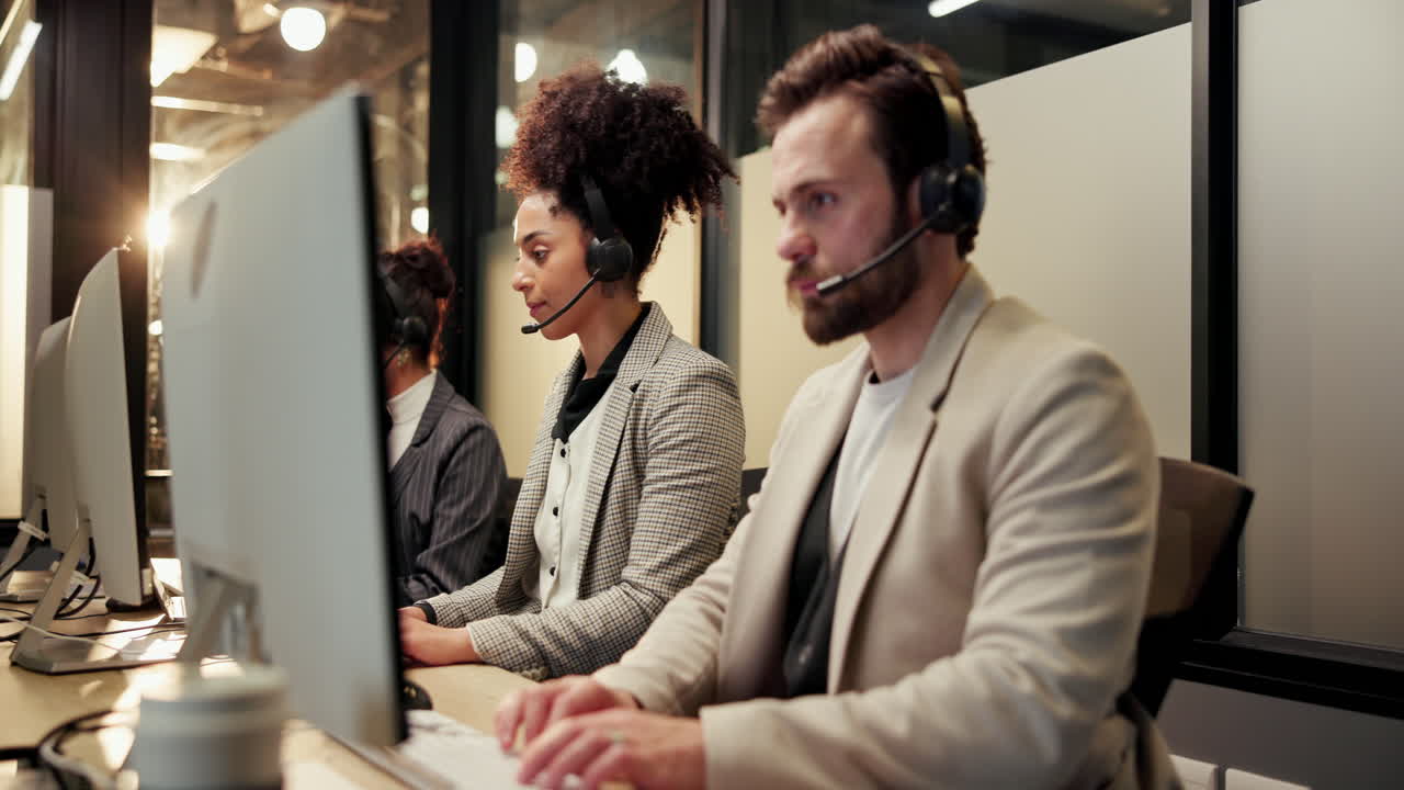 Team of customer service representatives working in a call center