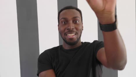 young hipster handsome afroamerican black man dancing hip hop style.