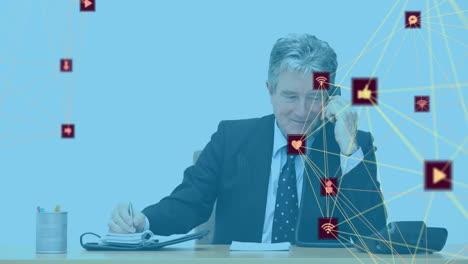 businessman working at desk with network connections and data processing animation