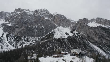 Overcast-Italian-ski-resort-Col-Druscie-Cortina-d'Ampezzo-Tofane-mountains-winter,-AERIAL