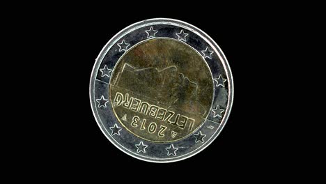 luxembourg 2013 2 euro obverse with grand duke henri portrait rotating on black background