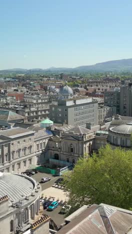 rising social ratio aerial video of the irish government's seanad éireann building in dublin city centre, ireland on a bright and sunny day. filmed in 1080x1920 and with rec709 color