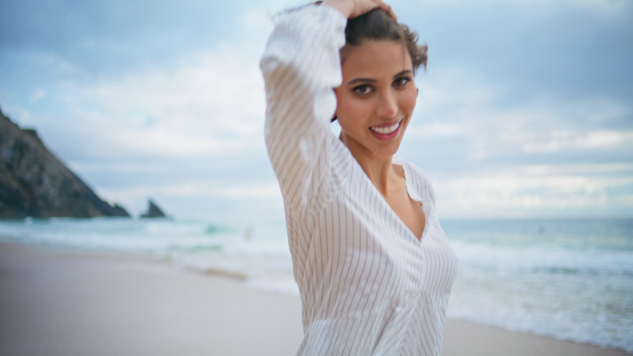 Attractive woman running beach in summer closeup. Carefree happy girl resting