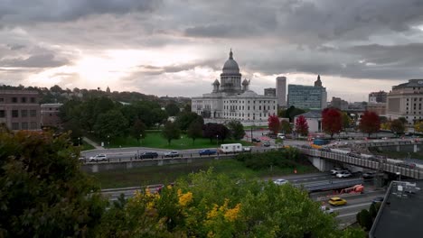 aerial push toward state capital through trees in providence rhode island