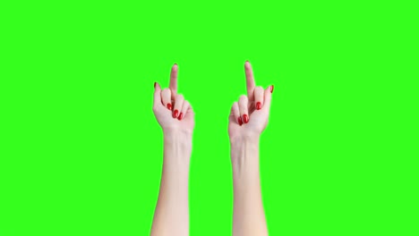 video de manos femeninas que muestran un dedo de follar en fondo verde