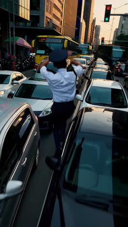 traffic police officer directing traffic in a congested city street