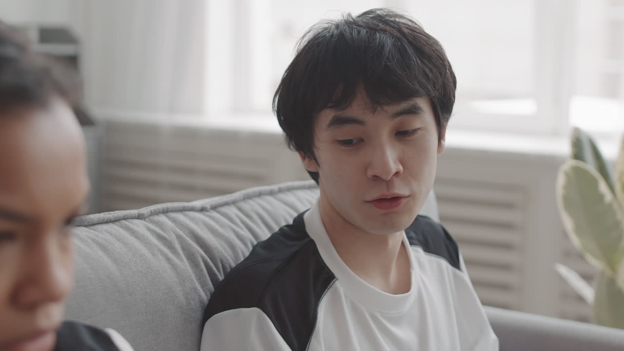 Couple Talking on Couch