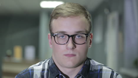 teenage boy wearing glasses