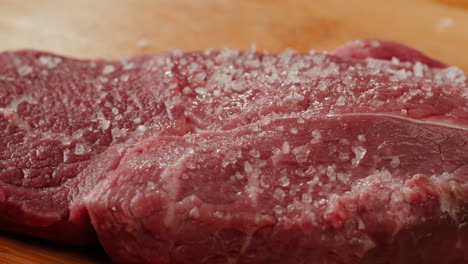 raw steak with salt