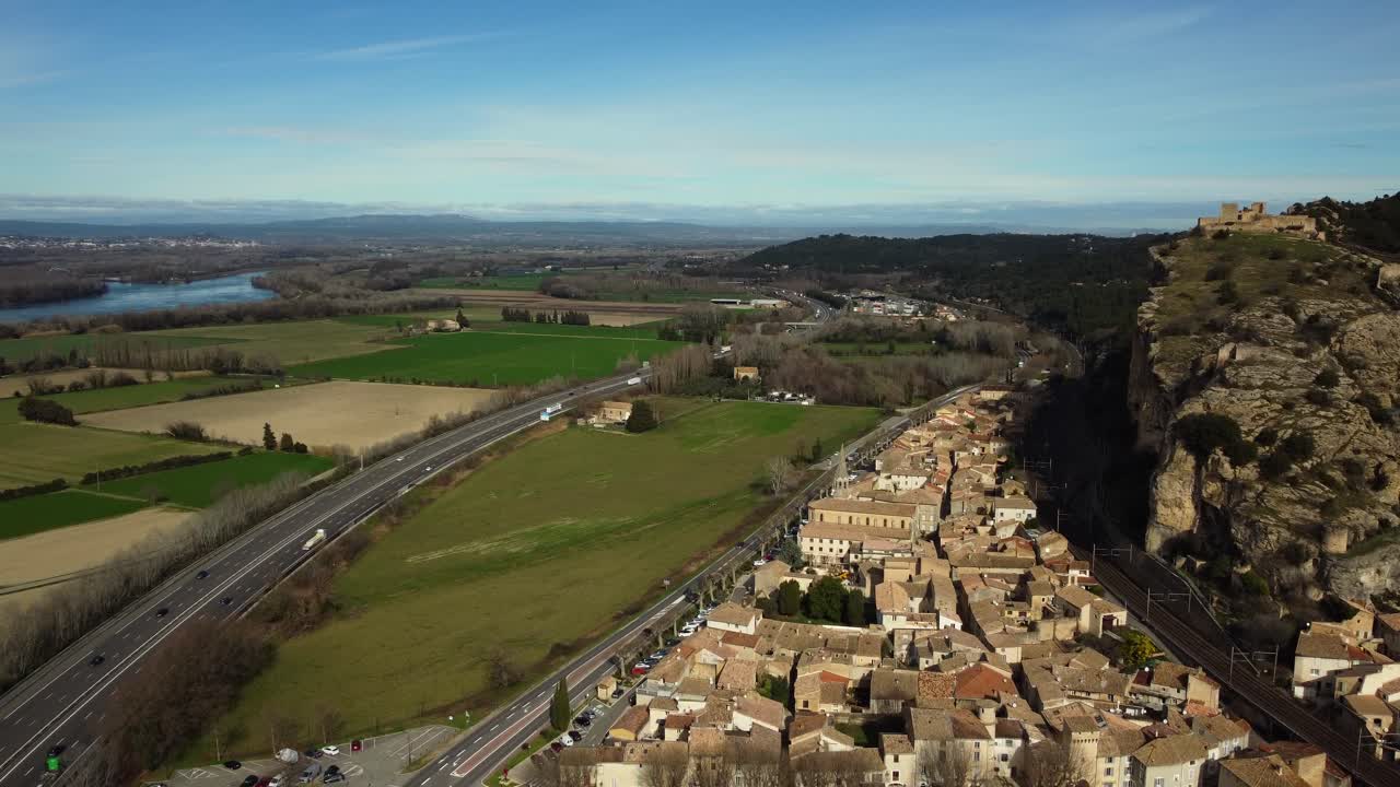 Aerial View of a Village, Highway, and Landscape