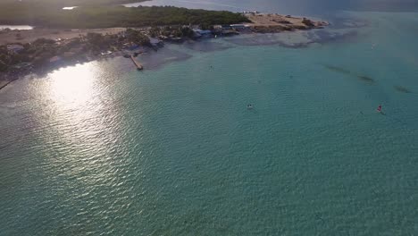 People-stand-up-paddling-in-Lac-Bay,-Bonaire