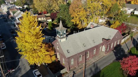 establishing shot of idyllic christian church in small town america