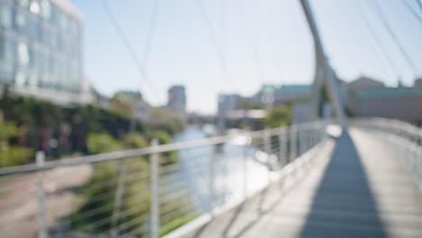 students walking on a bridge