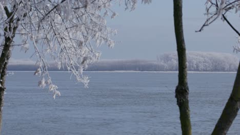 vast waterbody of danube river during freezing winter season in galati, romania