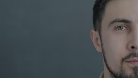 close-up of a man's half face.
