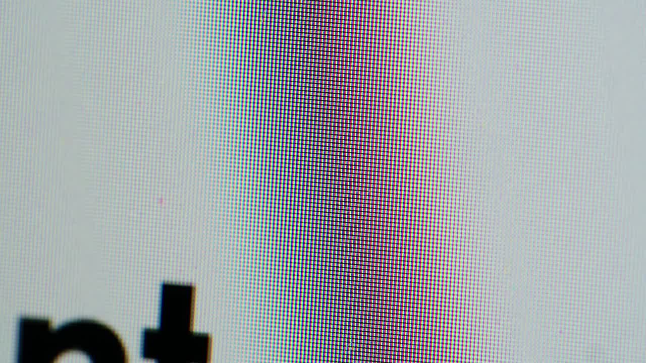 Close-up of Numbers and Financial Data Scrolling on a Digital Screen