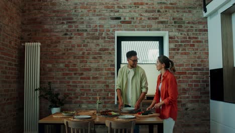 couple preparing a meal together in a modern kitchen