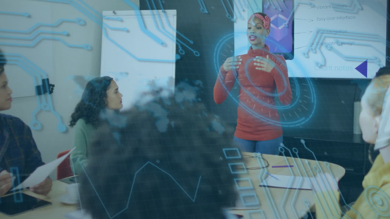 Diverse team in meeting with digital data processing animation overlay