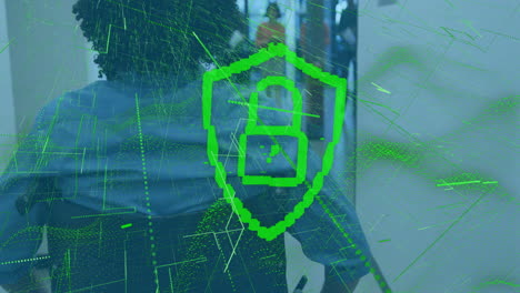 cybersecurity shield animation over people working in office environment