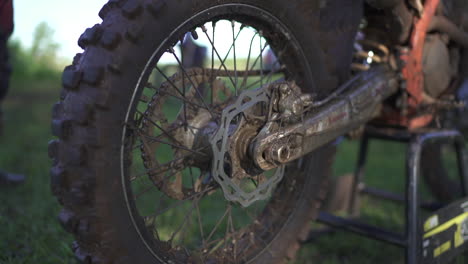 Slow-motion-image-showing-the-rear-wheel-of-a-motocross-bike-after-an-exhausting-race